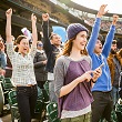 People cheering at stadium
