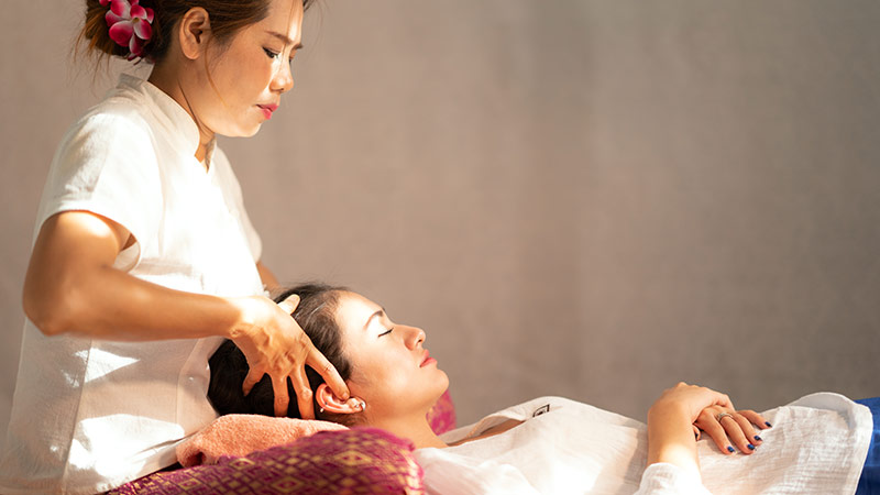 Asian old massager, Thai massage and spa for healing and relaxation