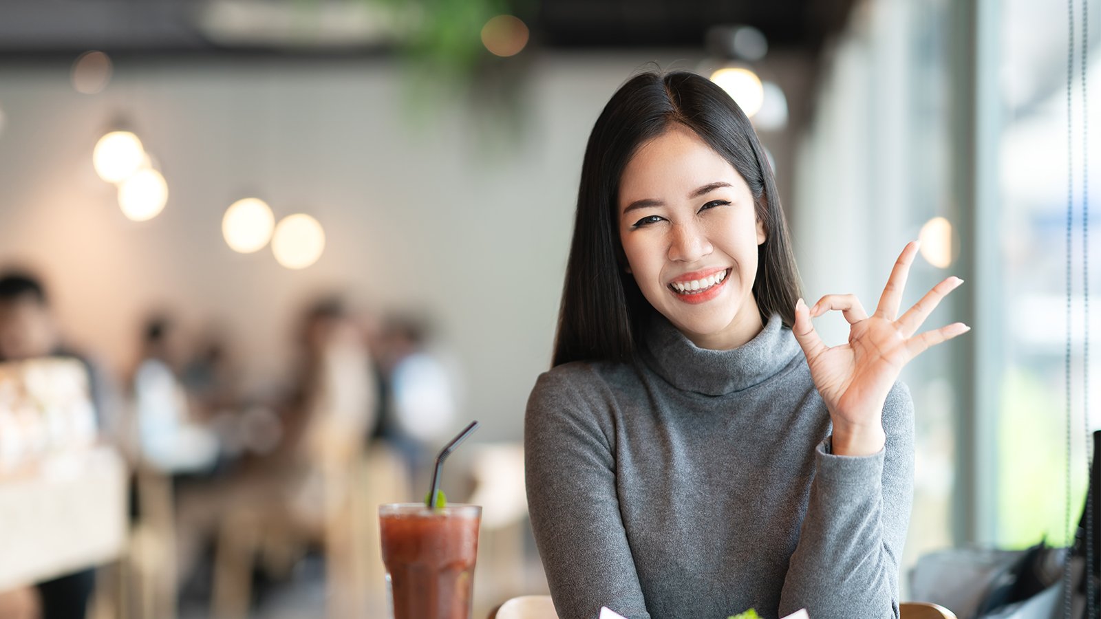 lady giving ok sign